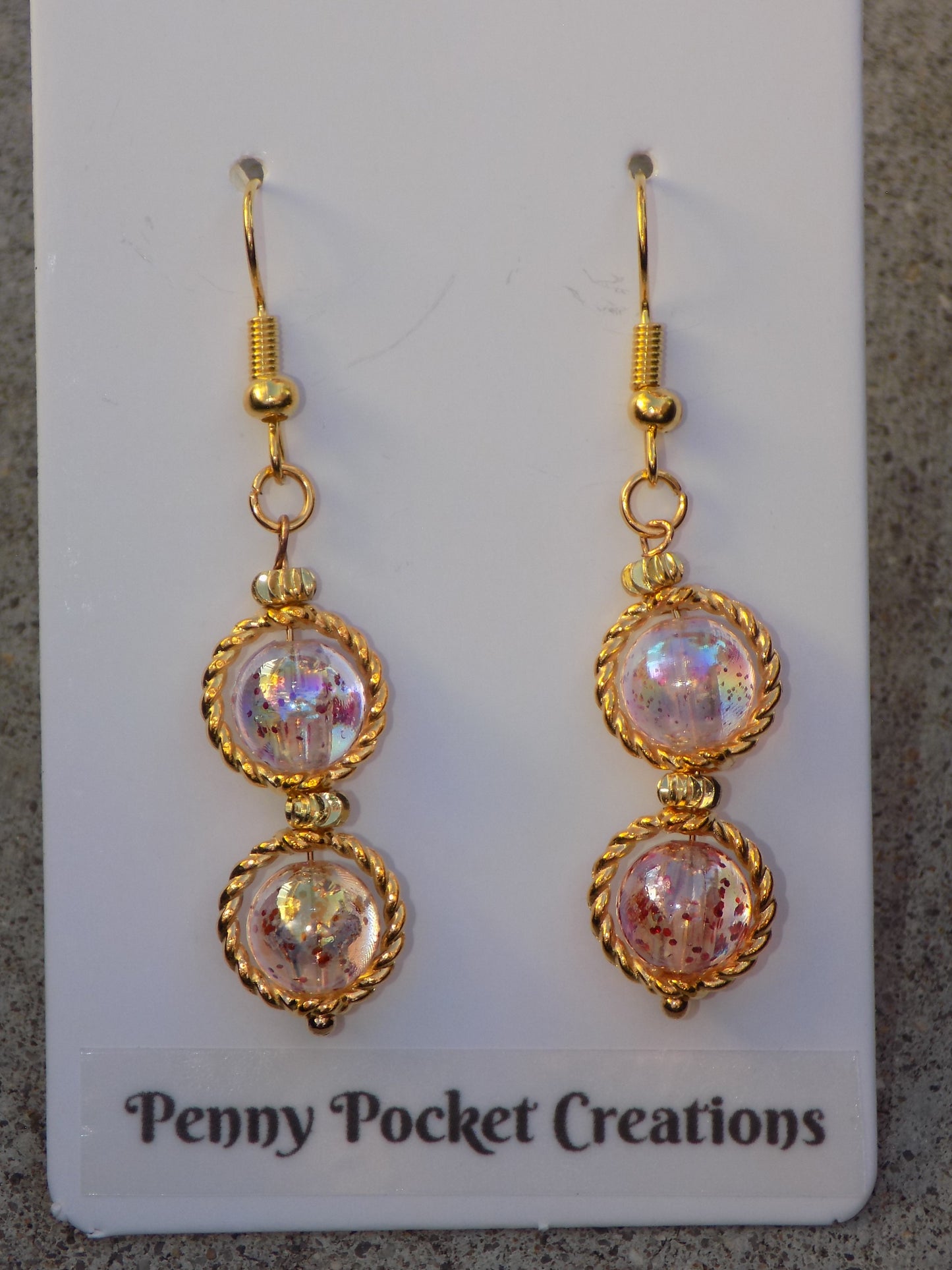 Golden Dangle Earrings Glossy Translucent Glitter Beads in Twisted Wire Bead Frames
