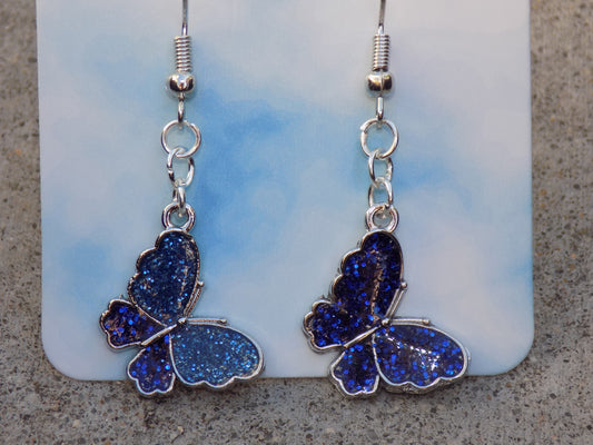 Silvery Butterfly Earrings Blue Glitter Resin Wings