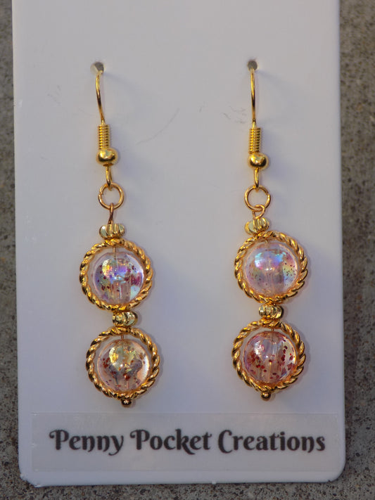 Golden Dangle Earrings Glossy Translucent Glitter Beads in Twisted Wire Bead Frames