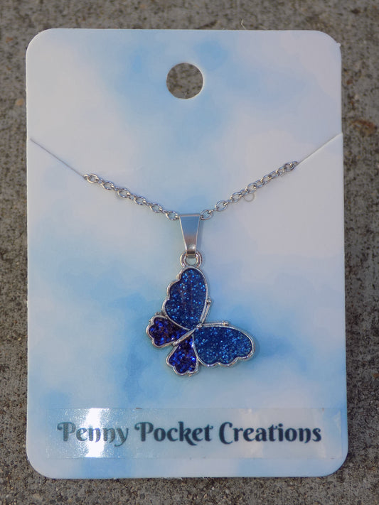 Silvery Butterfly Necklace Blue Glitter Resin Wings