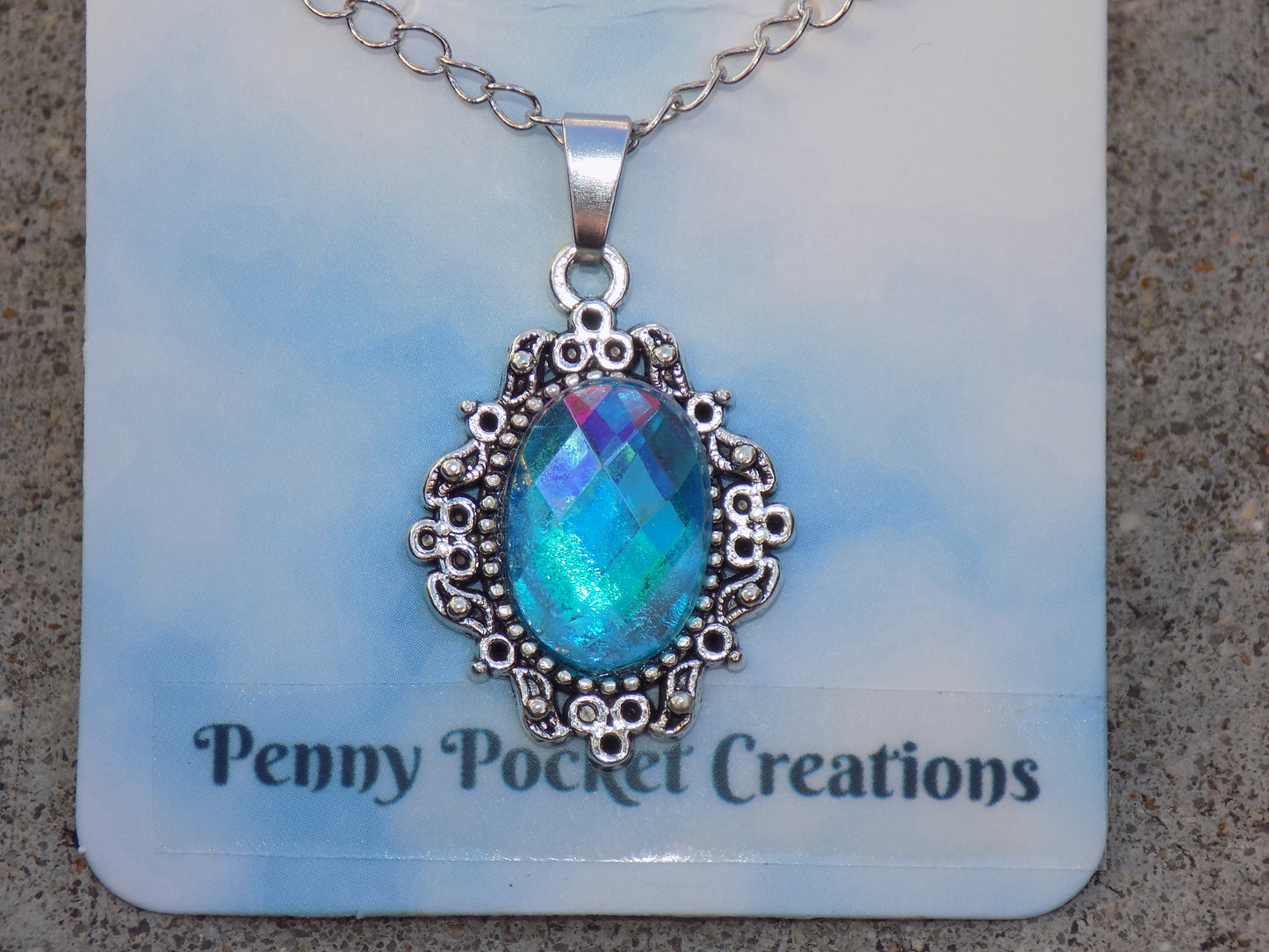 Silvery Plated Necklace Faceted 10x14mm Oval Rhinestone in 20x25mm Bezel Frame