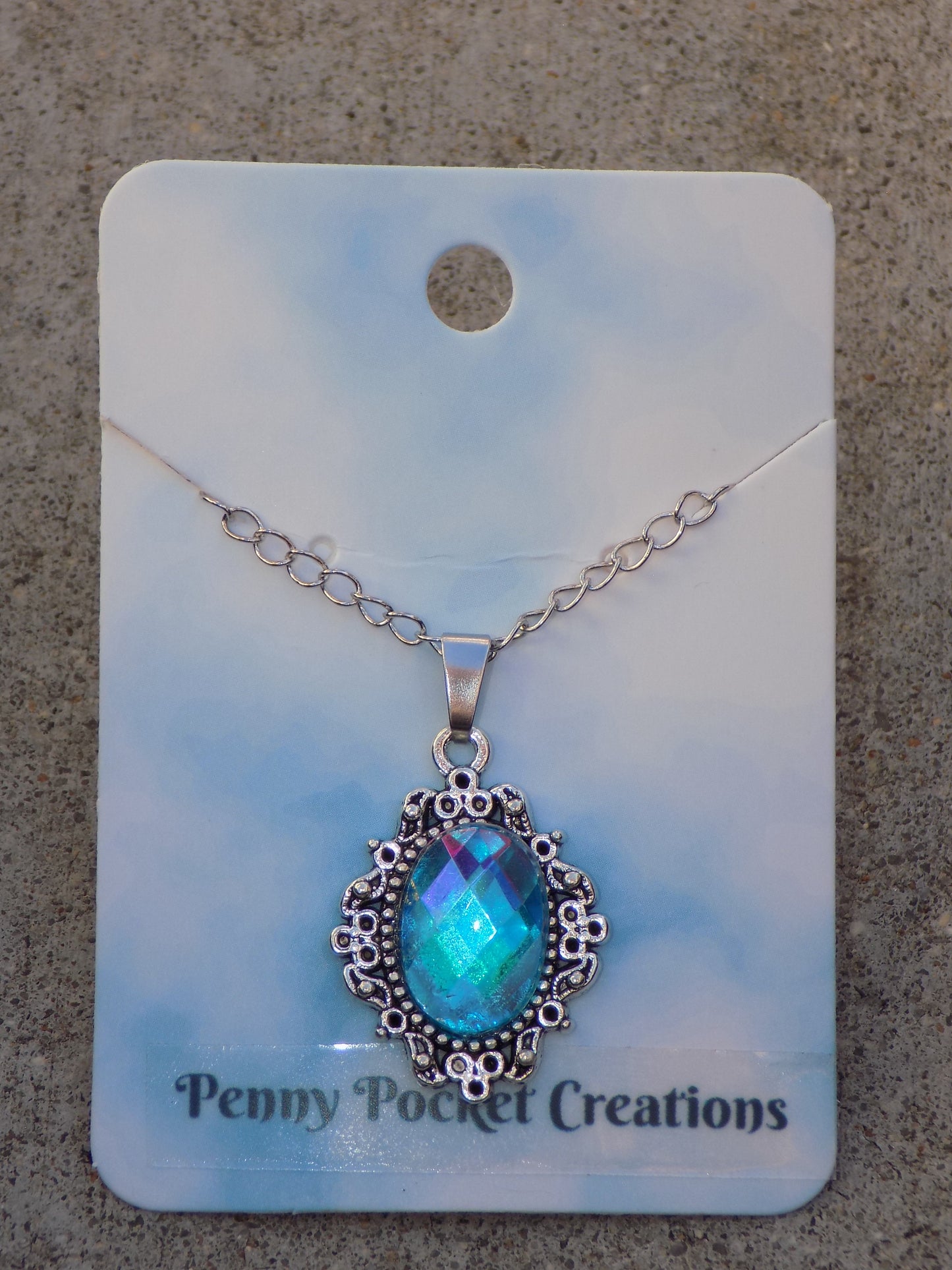 Silvery Plated Necklace Faceted 10x14mm Oval Rhinestone in 20x25mm Bezel Frame