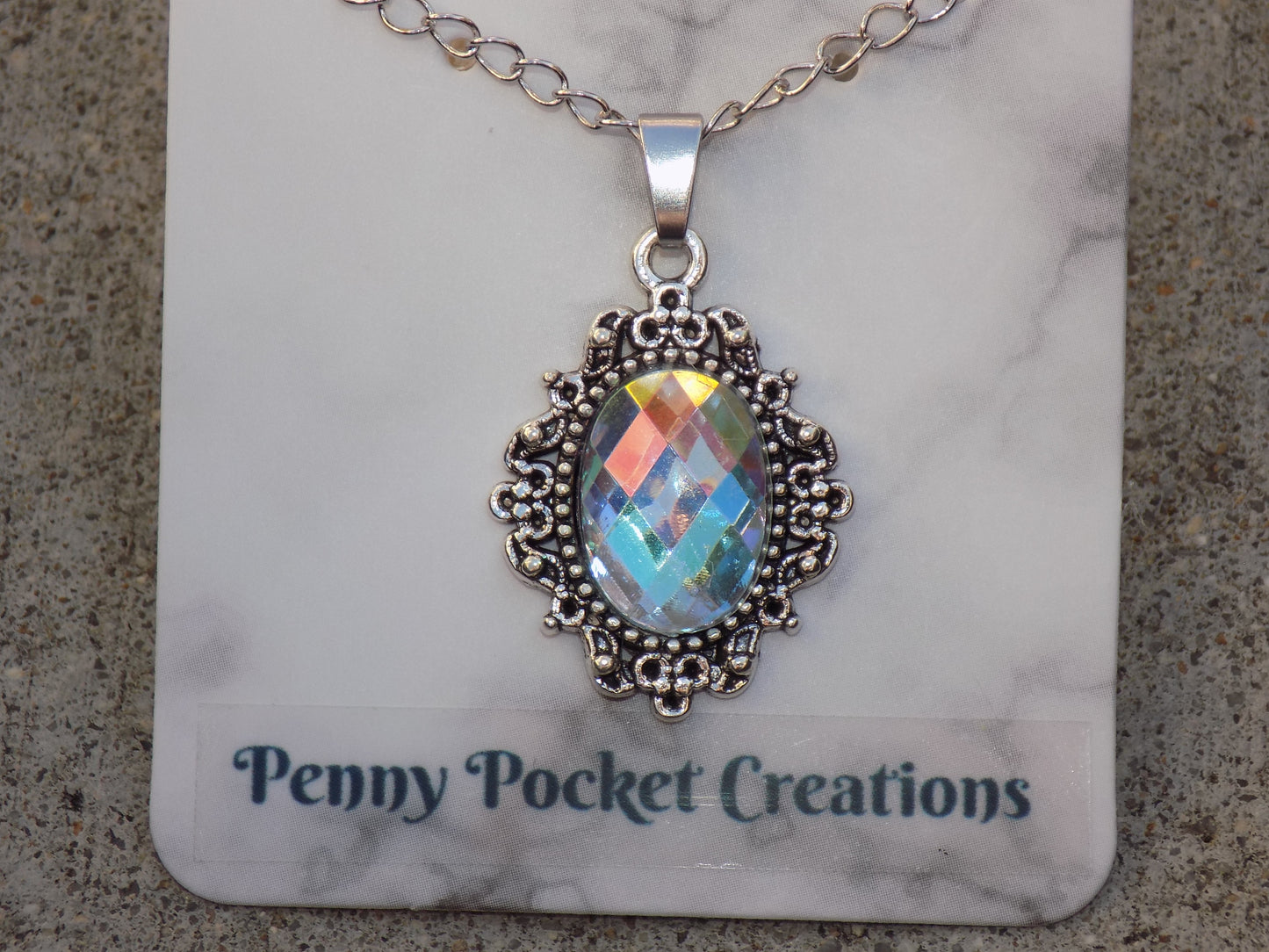 Silvery Plated Necklace Faceted 10x14mm Oval Rhinestone in 20x25mm Bezel Frame