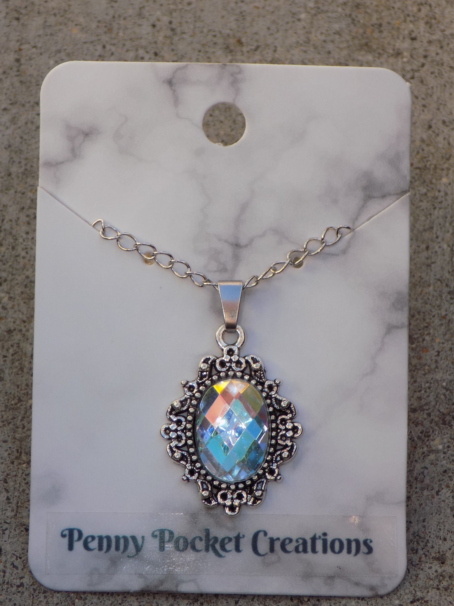 Silvery Plated Necklace Faceted 10x14mm Oval Rhinestone in 20x25mm Bezel Frame